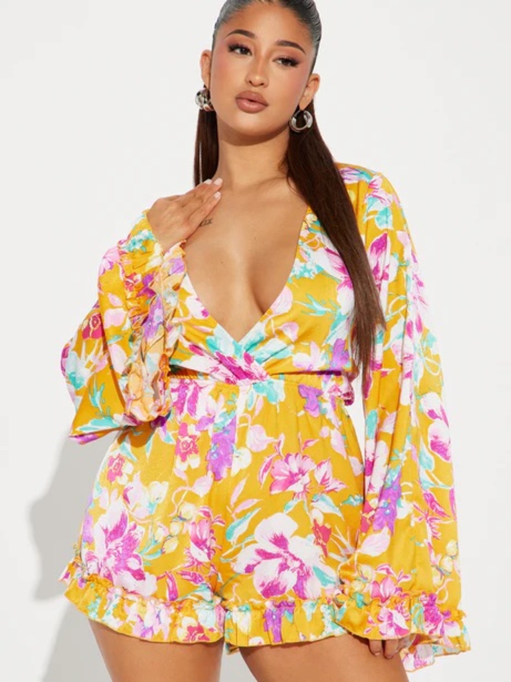 Fashion Nova Yellow Floral Surplice Romper with Pink & Teal Flowers